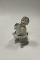 Royal Copenhagen Figur af Faun med hund No 2823