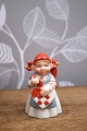 Royal Copenhagen Pixie nisse i porcelæn , nr.761.Pige med julehjerte. Højde: 6,5cm. Er i fin ...