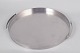 Arne Jacobsen for Stelton, serving tray.Round serving tray in stainless steel with minimalist ...