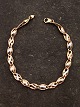 14 karat rød og hvid guld armlænke 19 cm. B. 0,55 cm. vægt 3,7 gram stemplet 585 emne nr. 640239