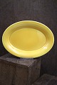 Ursula fad i fajance fra Royal Copenhagen designet af Ursula Munch-Petersen i gul glasur. ...