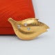 Ole Lynggaard; Broche af 14 kt. guld med diamanter