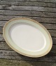Dagmar med guldkant Royal Copenhagen porcelæn spisestel. Kongelig porcelæn.Stort serveringsfad ...