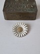 Anton Michelsen Marguerite brooch in gold-plated sterling silver with guilloché enamel. ...