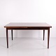Large vintage Danish Modern extendable dining table from the 1960s, crafted in richly grained ...