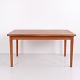 Vintage Danish Modern extendable dining table from the 1960s, crafted in teak with a clean ...