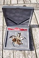 Christmas Ornament Poinsettia limited edition of gilt brass by Georg Jensen, Denmark. Same motif ...