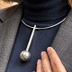 Andreas Mikkelsen; Necklace in sterling silver with a ballpendant, no. 16. From the 1970s.  ...
