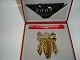 Georg Jensen 
2005 Juleuro 
24 Carat 
bladguld belagt 
messing.
Design Regitze 
Overgaard
I ...