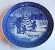 Royal 
Copenhagen 
Juleplatte 
(Kongelig, kgl) 
fra 1979 
"Choosing a 
Christmas 
Tree". Designed 
af ...