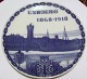 Kongelig 
Porcelæn  
Mindeplatte 
#173 Lille 
brændingsfejl
Inskription: 
Esbjerg 1868- 
...