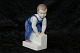 Bing & Grøndahl 
Figur, Jeg 
kommer nu. 
Dek. nr. 2399.
1.Sortering
Højde 13 ...