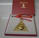 1986 Georg 
Jensen 
Christmas 
Mobile crafted 
in brass, 
plated with 24 
carat gold. 
With red 
ribbon. ...
