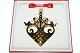 Georg Jensen 
1992 Christmas 
turmoil 
24 Carat gold 
leaf plated 
brass. 
Design Jette 
...