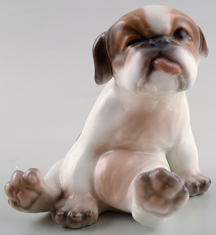 Dahl Jensen hundefigur, Pekingeserhvalp.
Dekorationsnummer 1134.