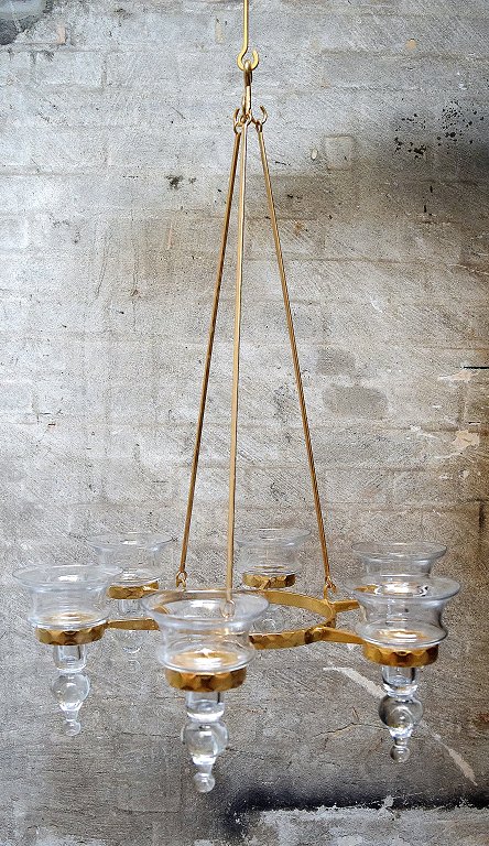 Erik Höglund for Kosta Boda. Sweden 60 / 70s.
Six armed chandelier made of brass.