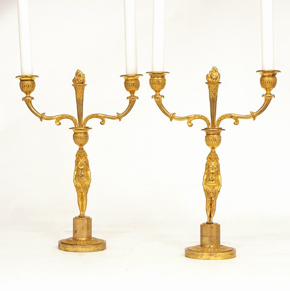 Pair of gilt bronze candelabra. France circa 1810. H: 35cm. W: 26cm