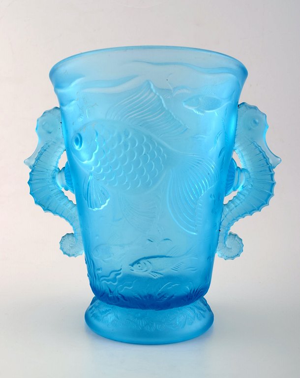 Lalique style art glass vase in turquoise with seahorses in relief.
