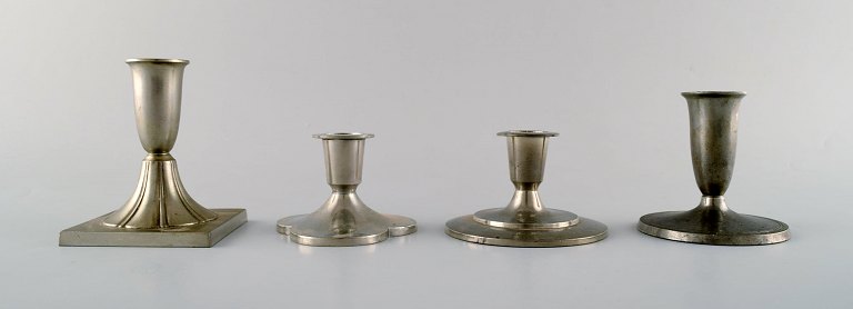 4 pcs. Just Andersen art deco pewter candlesticks.