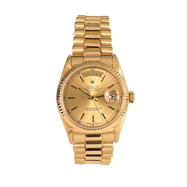 Rolex Day Date i 18kt guld. Solgt 1. gang hos autoriseret Rolexforhandler 
23.12.1989. Fuldt sæt med box, certifikat og meget tilbehør. Nyserviceret fra 
autoriseret Rolex værksted. Ref. 18238. D: 36mm