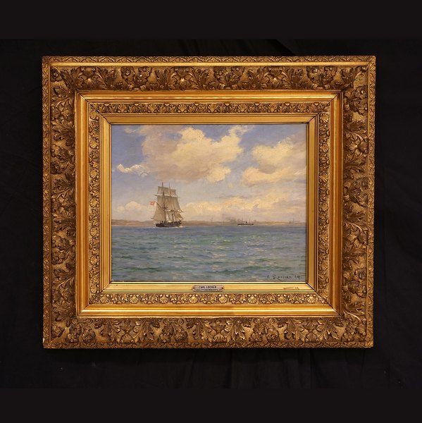 Carl Locher, 1851 Flensborg - 1915 Skagen: Marinemotiv med Kronborg i 
baggrunden. Olie på lærred. Signeret og dateret 1889. Lysmål: 30x37cm. Med 
ramme: 55x62cm