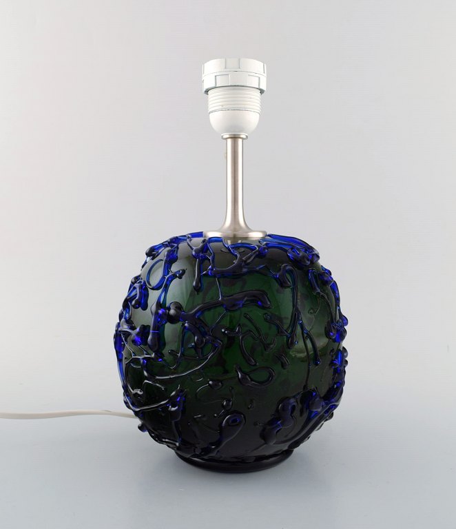 Kastrup / Holmegaard. Rare round table lamp in dark green and blue art glass. 
Modern design, 1960