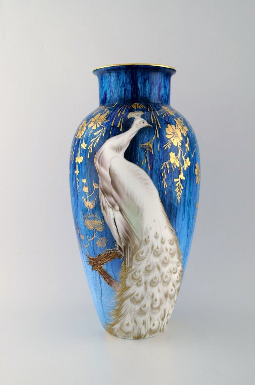 Heinrich, SELB Bavaria Germany. Large hand painted porcelain vase with peacock 
and gold decorated leaves. 1960