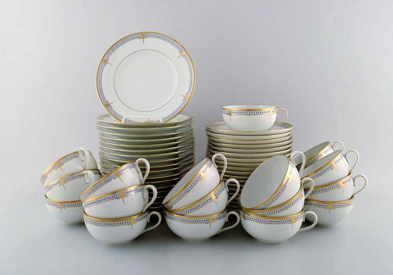 Bing & Grondahl / B&G. Rare porcelain tea service. Complete for 19 people with 
accompanying plates. Model number 473.