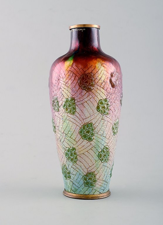 Alexandre Marty for Limoges, France. Art nouveau bronze vase in enamel work. 
Green leaves on red background. Ca. 1910.