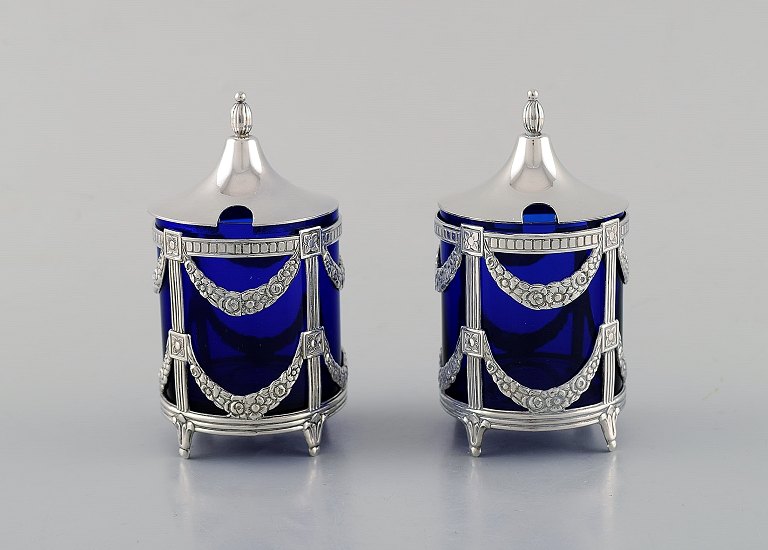 Swedish silversmith. Two sugar bowls in silver. Empire style with royal blue 
glass inserts.