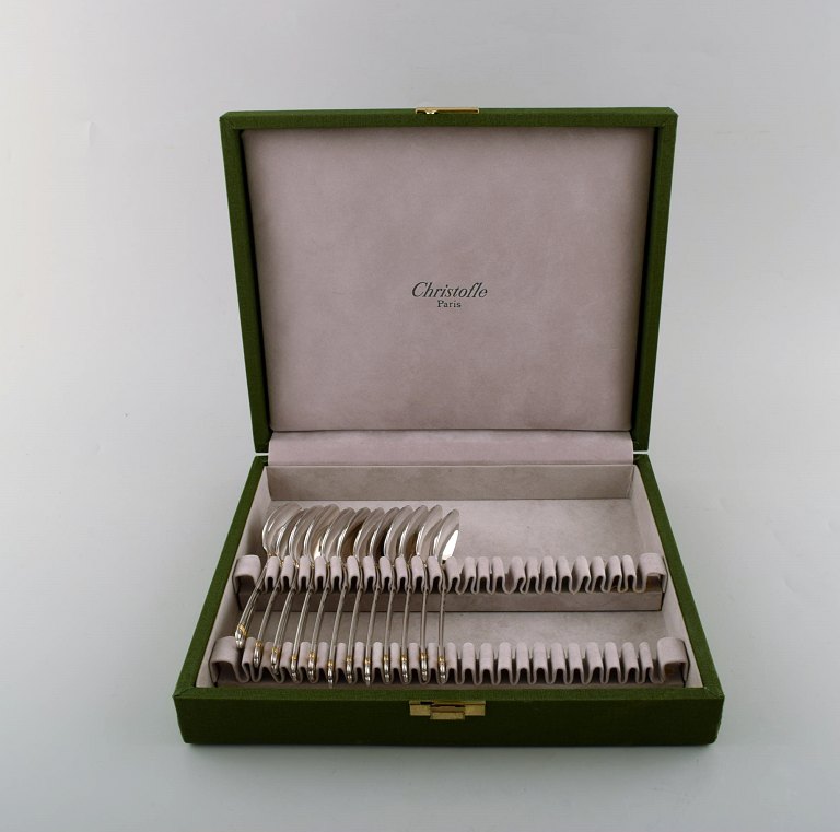 Bernard Yot for Christofle. 12 "Aria" tea spoons in plated silver with gold 
accent. In original box.
