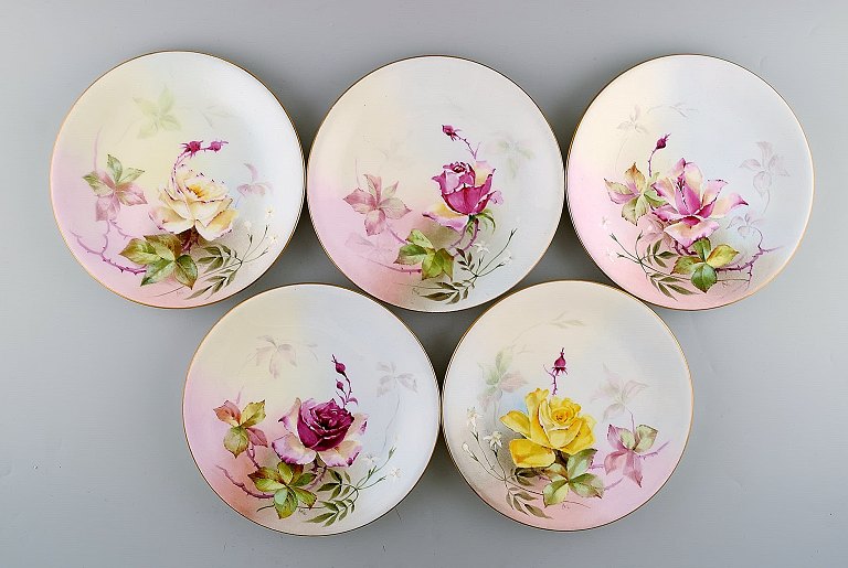 Fem Royal Worcester tallerkener med blomstermotiver. Ca. 1930