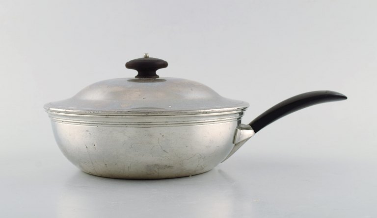 Just Andersen, Denmark. Rare art deco lidded pan in pewter with knob and handle 
in bakelite. Model number 1902. 1940