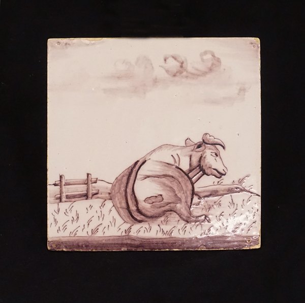 An early 19th century Dutch tile with a cow. Circa 1800. Size: 13x13cm