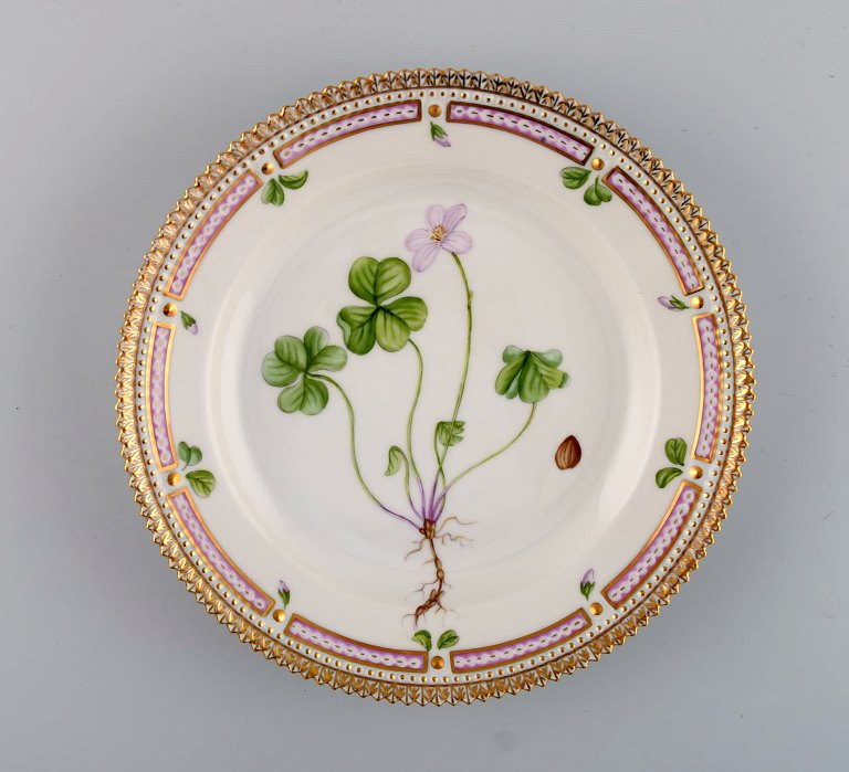 Royal Copenhagen Flora Danica salad plate in hand-painted porcelain with flowers 
and gold decoration. Model number 20/3573.
