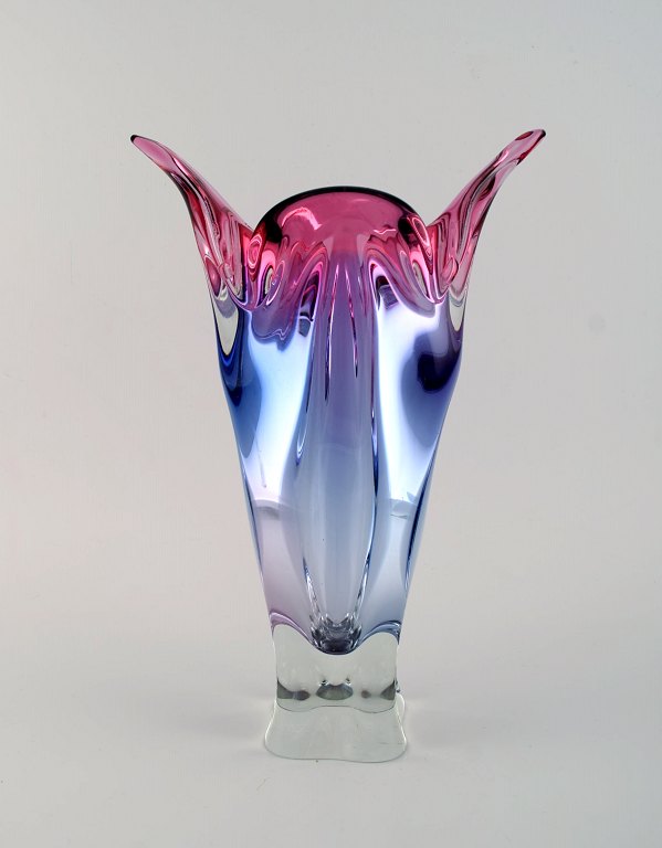 Large organically shaped Murano vase in mouth blown art glass. Purple and light 
blue shades. Italian design, 1960