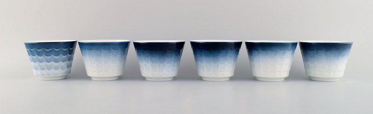 Wilhelm Kåge for Gustavsberg. Six flower pot covers in porcelain. Swedish 
design, 1960s.
