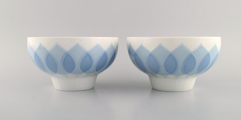 Bjørn Wiinblad for Rosenthal. Two Lotus bowls in porcelain decorated with light 
blue lotus leaves. 1980s.
