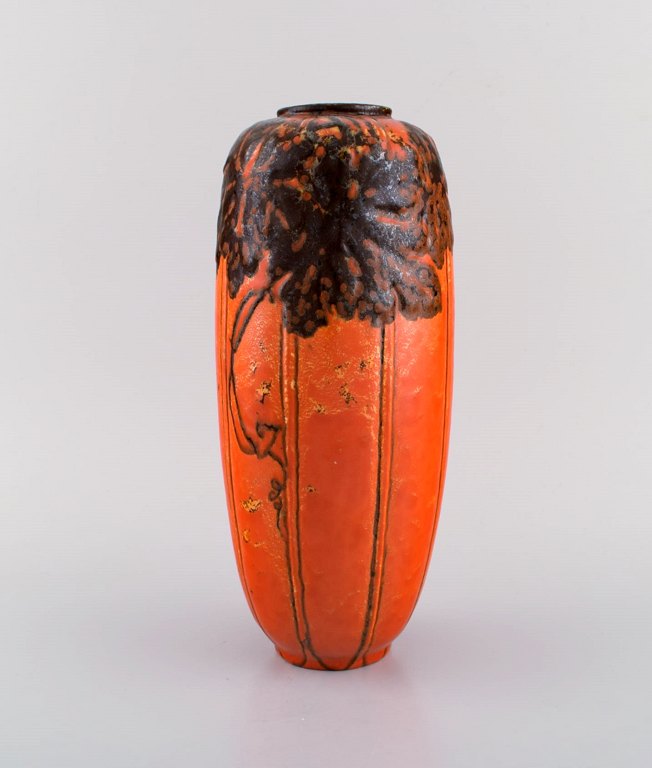 Royal Pilkington, England. Vase in glazed ceramics. Beautiful orange glaze and 
metallic flowers. 1920s / 30s.
