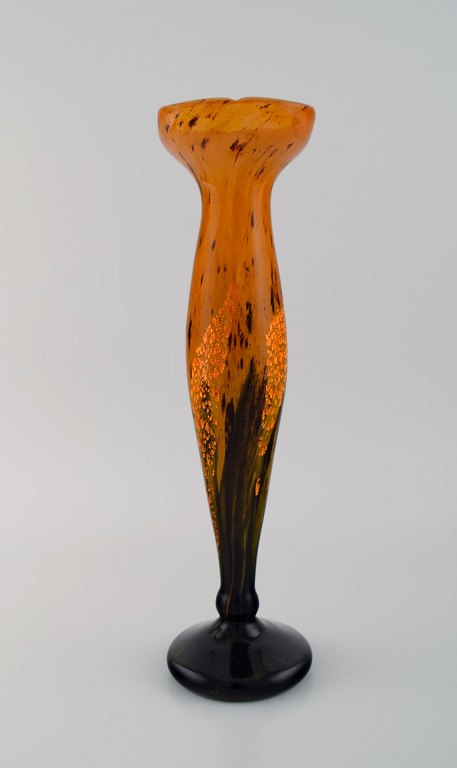 Daum Nancy, France. Large art deco "Verre de jade" vase in orange and black 
mouth blown art glass with inlaid gold decoration. Dated 1919-23.
