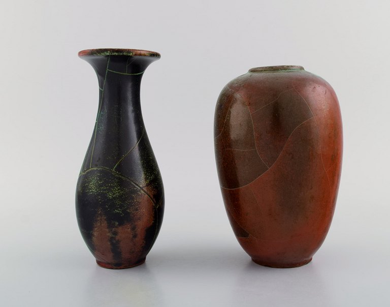 Paul Dressler for Grotenburg, Germany. Two vases in glazed stoneware. Beautiful 
crackle glaze in shades of red and green. 1940s.
