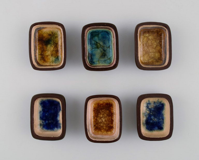 Knut Paul. Six small bowls in glazed stoneware. Beautiful polychrome glaze. 
Mid-20th century.
