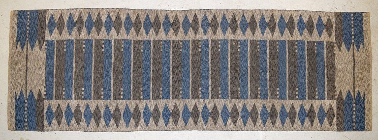 Swedish textile designer, runner in wool. Geometric fields in grey, white and 
blue shades. 1960s/70s.