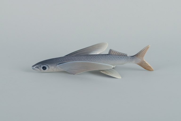 Royal Copenhagen Flying Fish Figurine number 3050 
Designed by Platen Hallermundt 1960.