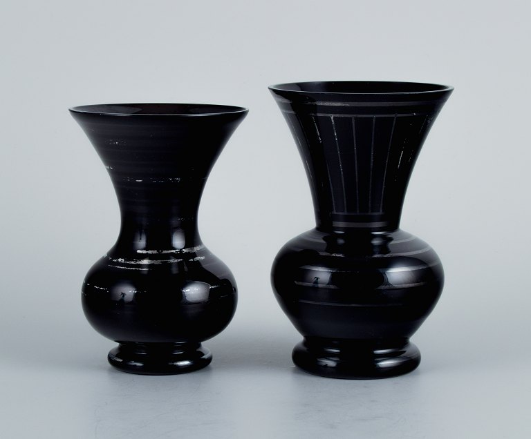 Two Art Deco glass vases, Germany. With horizontal silver inlays.