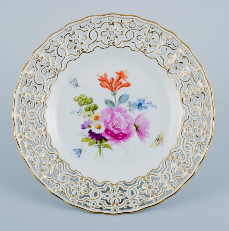 Meissen, Germany, openwork plate hand painted with flowers and butterflies.