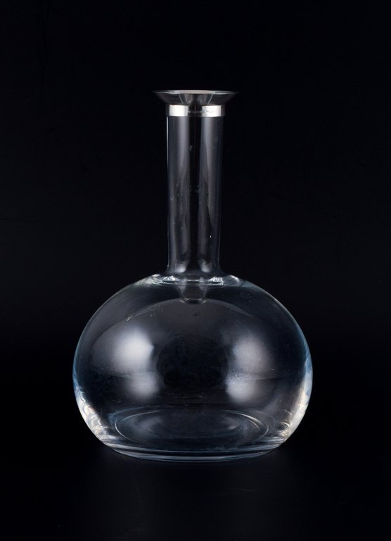 Ole Palsby for Georg Jensen, vinkaraffel i klart glas og sterlingsølv.