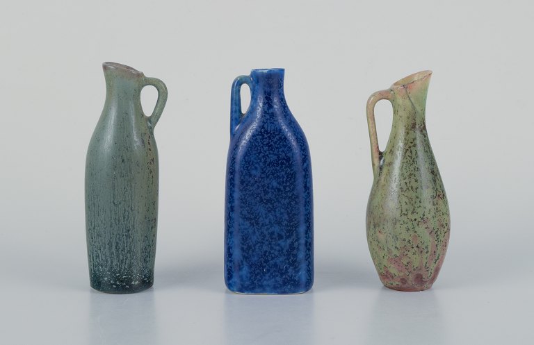 Carl Harry Stålhane for Rörstrand, three miniature vases/pitchers.
