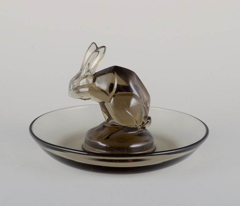 René Lalique, France. Early Art Deco pin dish with a rabbit in smoked art glass.