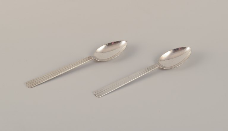 Georg Jensen, a pair of Bernadotte dinner spoons.